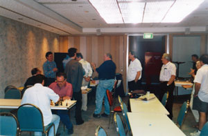 a-group-at-the-prize-calculation-table-Gosford-Open-2003-webversion (18K)